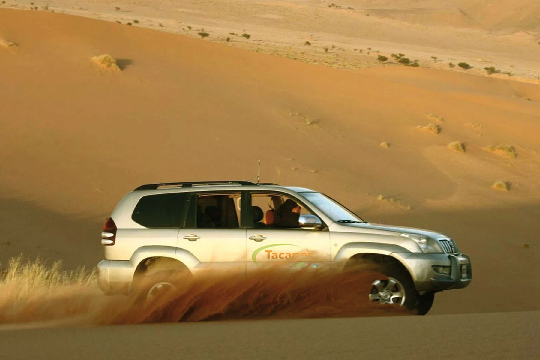 4WD Tour crossing the huge dunes